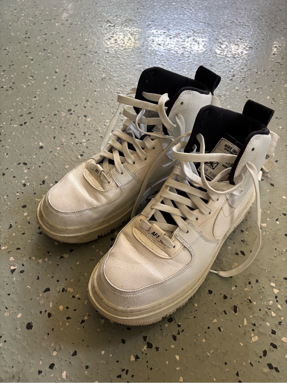 Nike Women’s High-Top Sneakers in White with Black Collar
